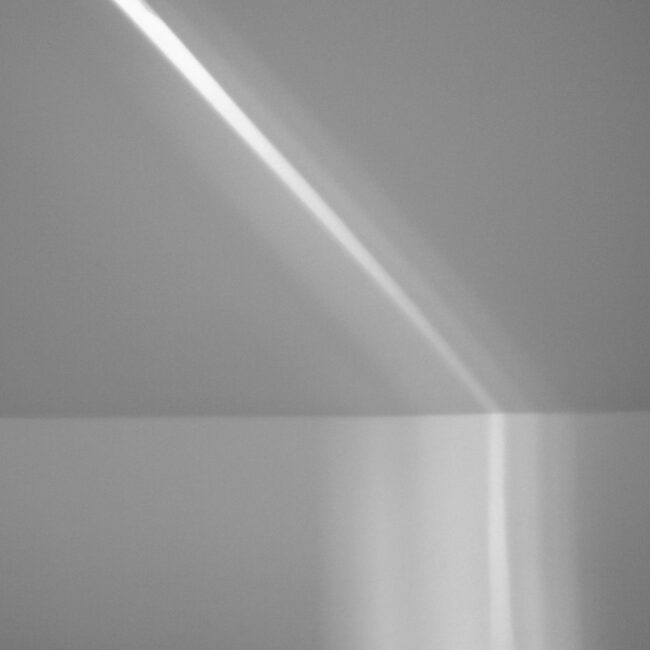 shadow line on a grey wall