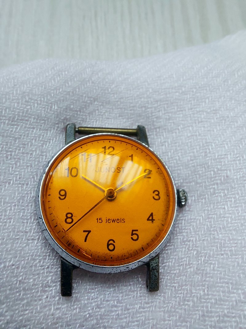 Junost soviet watch with orange dial.
