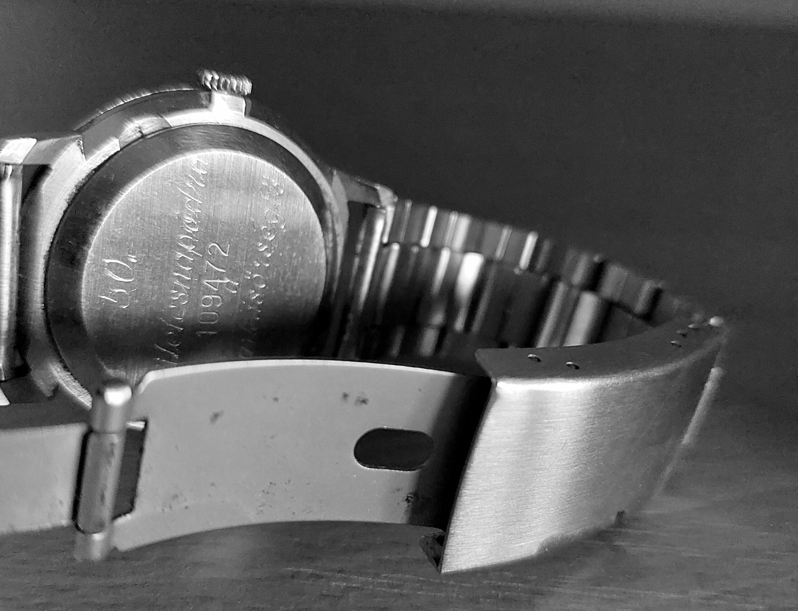 Raketa soviet watch back with engravings.